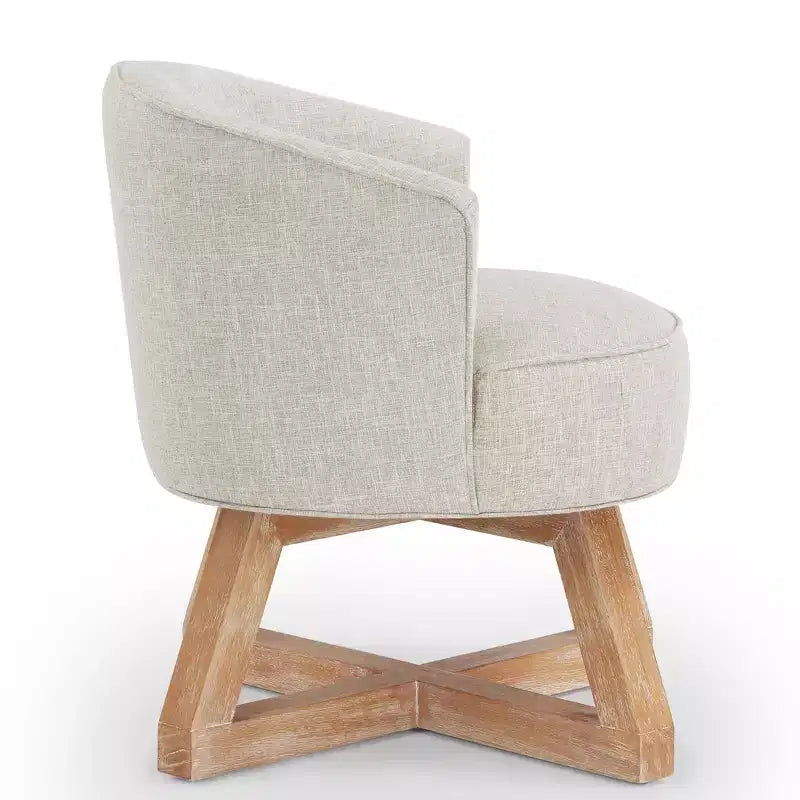 Chaise à piètement croisé en bois d'hévéa et revêtement en lin, pivotante à 360°